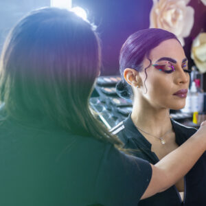 Professional makeup artist doing a celebrity makeup